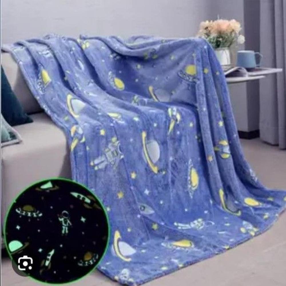 Manta luminosa niños astronauta