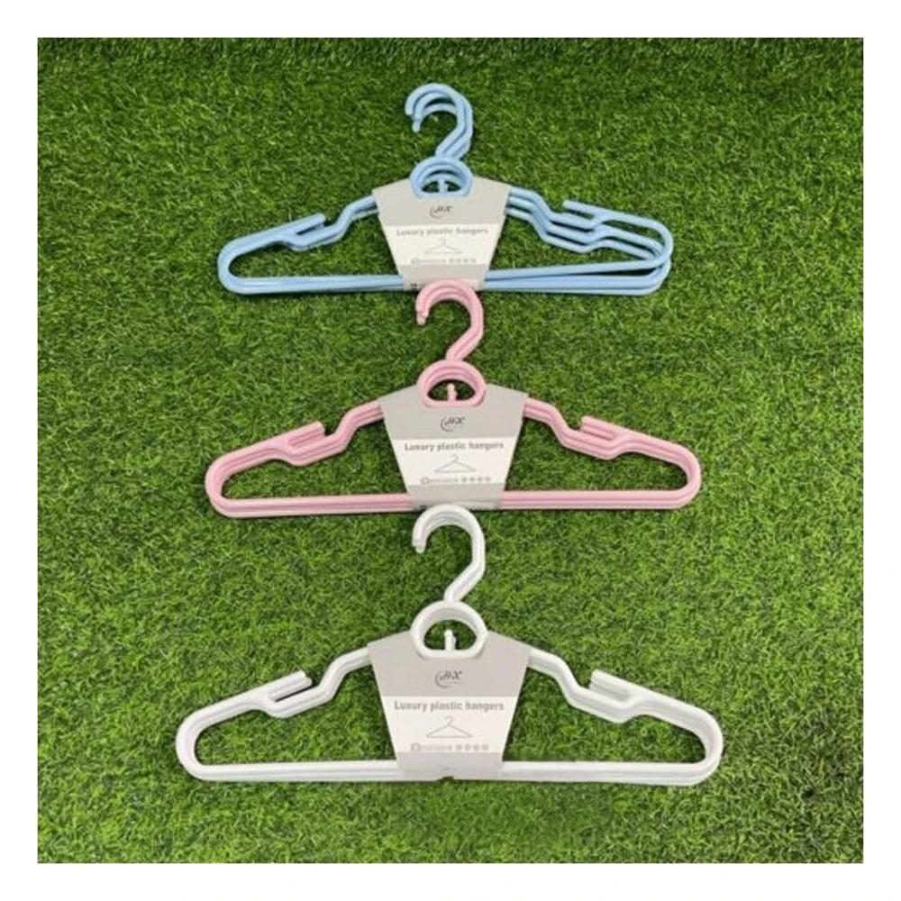 Percha de Plastico Blanco con Detalle Circular en Medio de 4 Piezas Y+Regalo Sticker