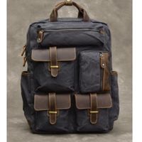 Mochila de tela lona impermeable con varios compartimiento