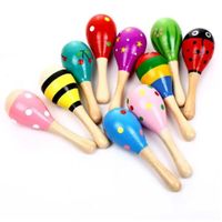 DIA DEL NIÑO - Instrumento Musical Maracas de Madera Multicolor