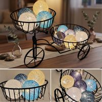 Decoracion de Mesa con Luces  y Triciclo Multifuncional