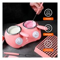 Cacerola chocolatera doble con accesorios en color rosado para hogar