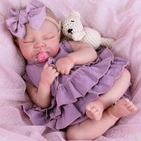 MUÑECA BEBÉ REBORN AORI NIÑA CON KIT DE ALIMENTACIÓN 50 CM