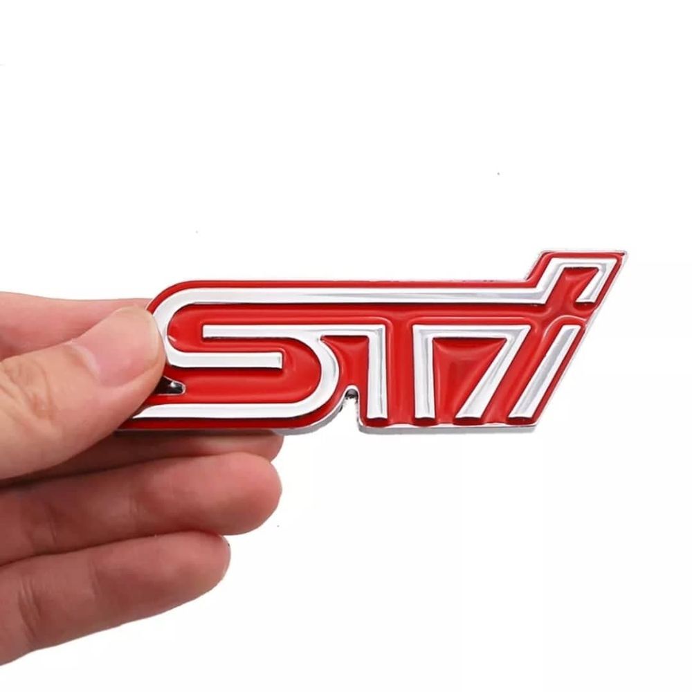 Emblema Adhesivo Sti - Promart