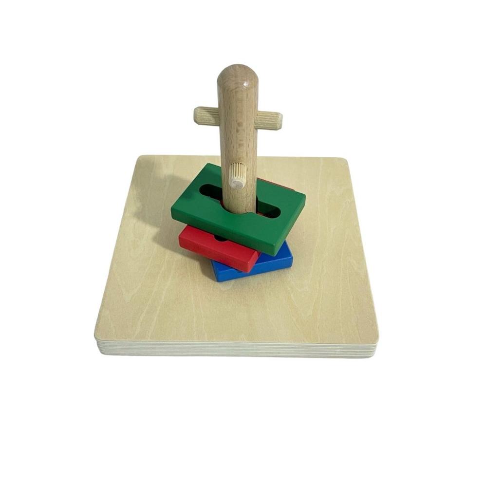 Apilador de formas giratorias Chanitos Cunita montessori Apilador de formas giratorias Chanitos Cunita montessori