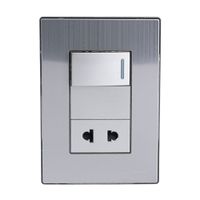 Placa Armada Orange: Interruptor + Tomacorriente Acero Inoxidable