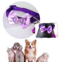 COLLAR PARA MASCOTAS CON MOÑO Y CASCABEL PURPURA.